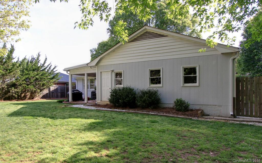 4310 Walker Road Charlotte, NC 28211 - Photo 16 of 16 a front view of house with yard and green space
