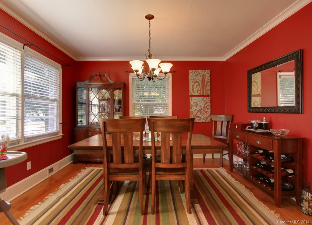 4310 Walker Road Charlotte, NC 28211 - Photo 4 of 16 a view of a dining room with furniture window and wooden floor