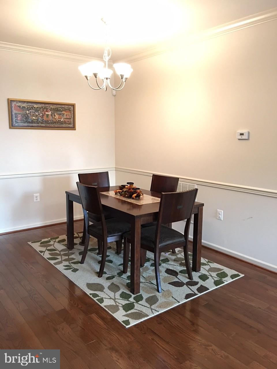 23337 Tradewind Drive Ashburn, VA 20148 - Photo 11 of 28 a view of a dining room with furniture