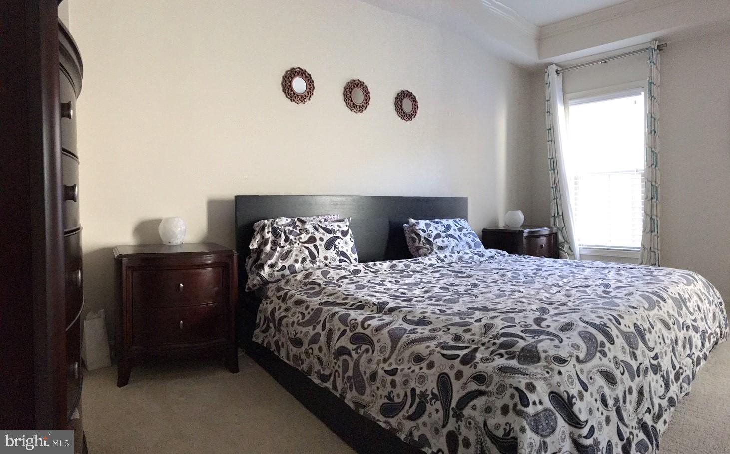 23337 Tradewind Drive Ashburn, VA 20148 - Photo 19 of 28 a bedroom with a bed and a window