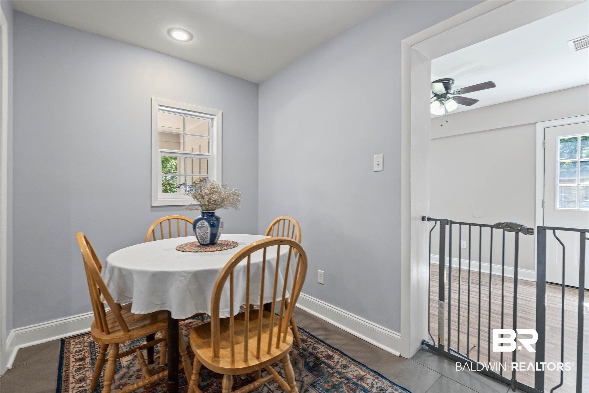 5609 Diane Court Mobile, AL 36618 - Photo 8 of 22 Dining room with baseboards and ceiling fan