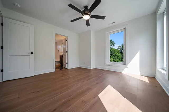 an aerial view of houses with backyard