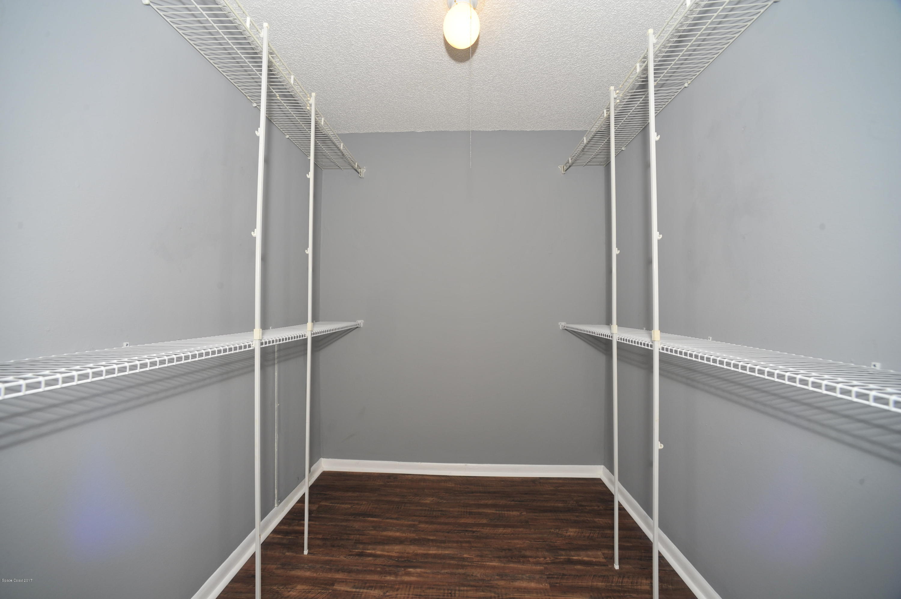 875 Doverbrook Road Northwest Palm Bay, FL 32907 - Photo 13 of 17 walk-in closet