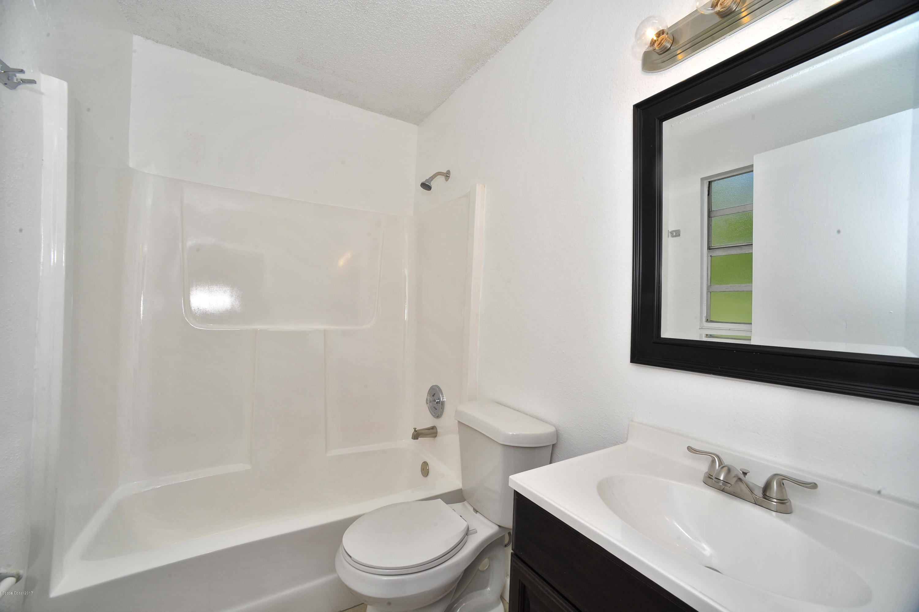 875 Doverbrook Road Northwest Palm Bay, FL 32907 - Photo 14 of 17 master bath