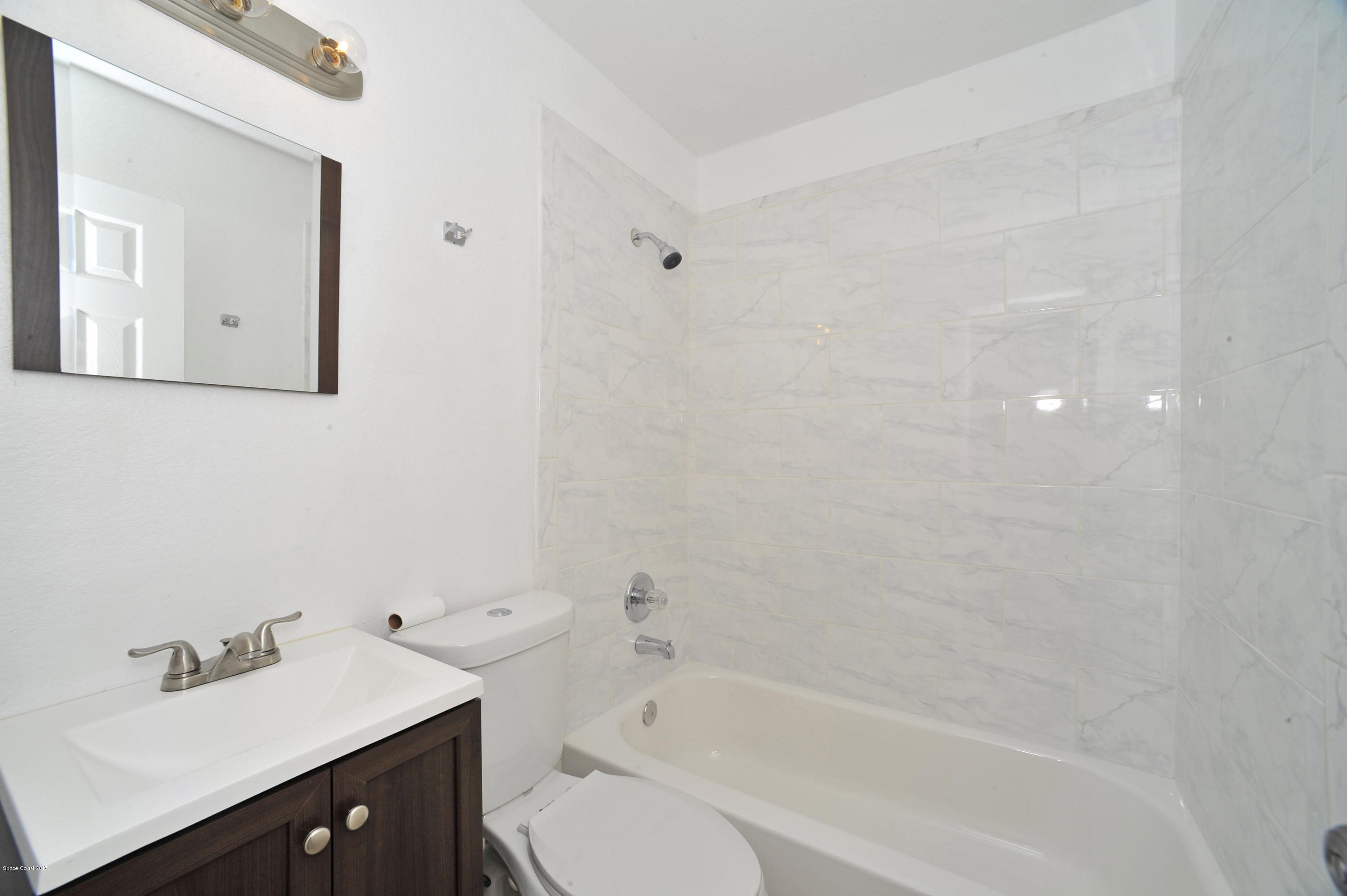 875 Doverbrook Road Northwest Palm Bay, FL 32907 - Photo 9 of 17 guest bath
