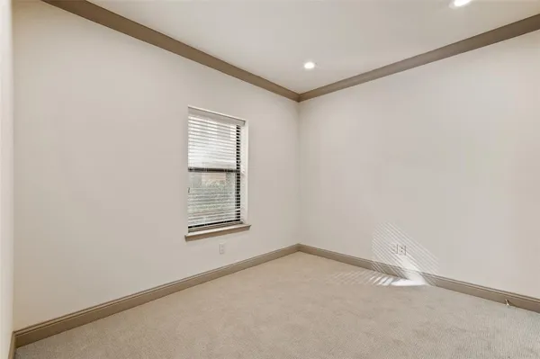 a bathroom with a shower a sink and toilet
