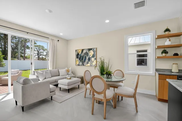 a bedroom with a bed and a table