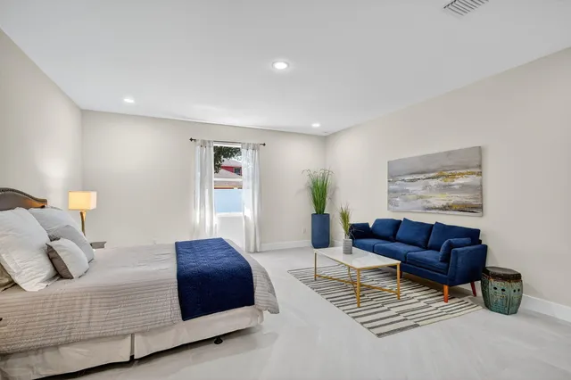 a bathroom with a shower and toilet