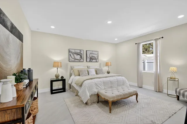 a view of a house with backyard and porch