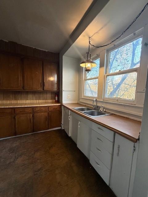 718 12th Street Southeast Paris, TX 75460 - Photo 9 of 20 a kitchen with stainless steel appliances granite countertop a sink a stove and a window