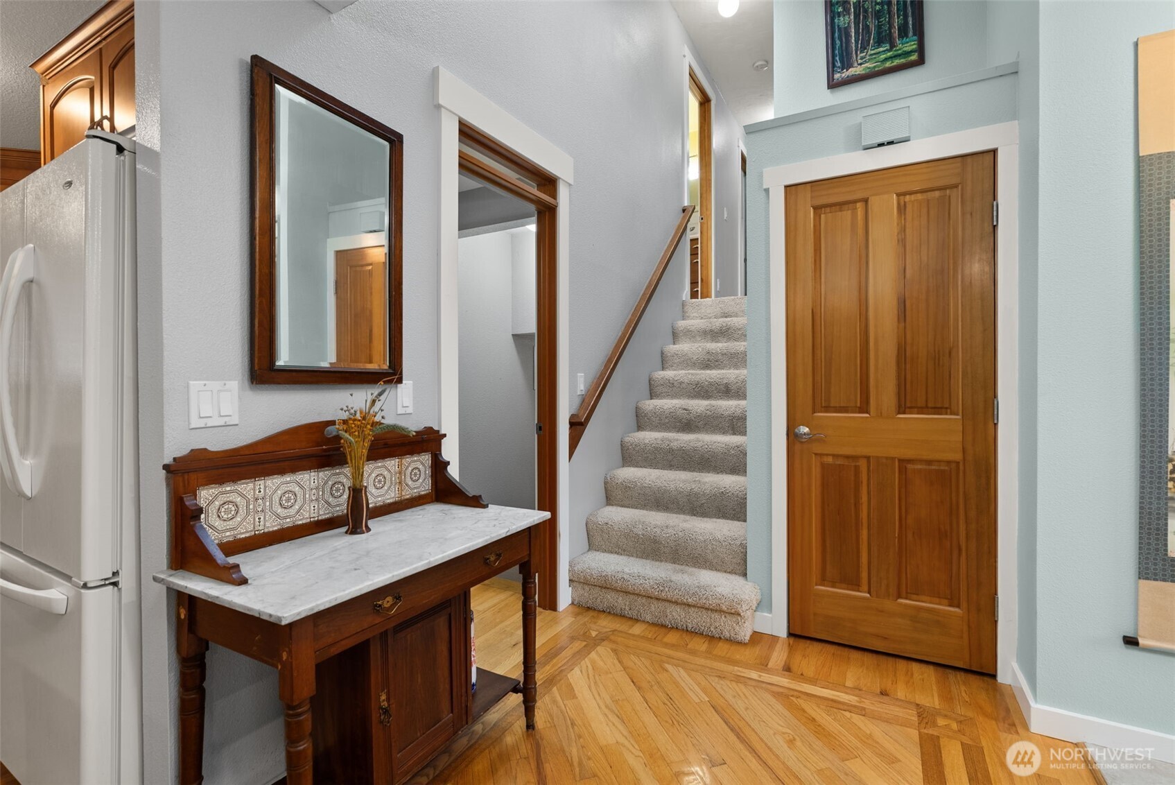 1105 Irving Street Southwest Tumwater, WA 98512 - Photo 15 of 38 a view of a hallway with entryway and wooden floor