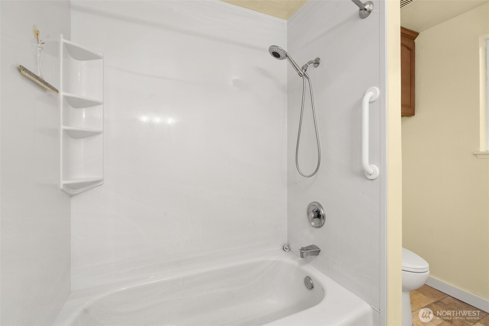 1105 Irving Street Southwest Tumwater, WA 98512 - Photo 18 of 38 a bathroom with a bath tub with a shower