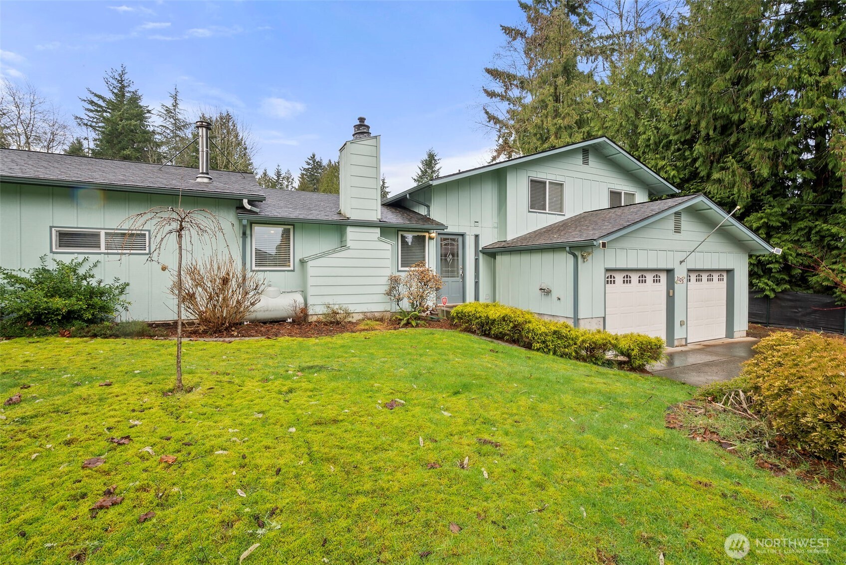 1105 Irving Street Southwest Tumwater, WA 98512 - Photo 2 of 38 a view of a yard in front of house