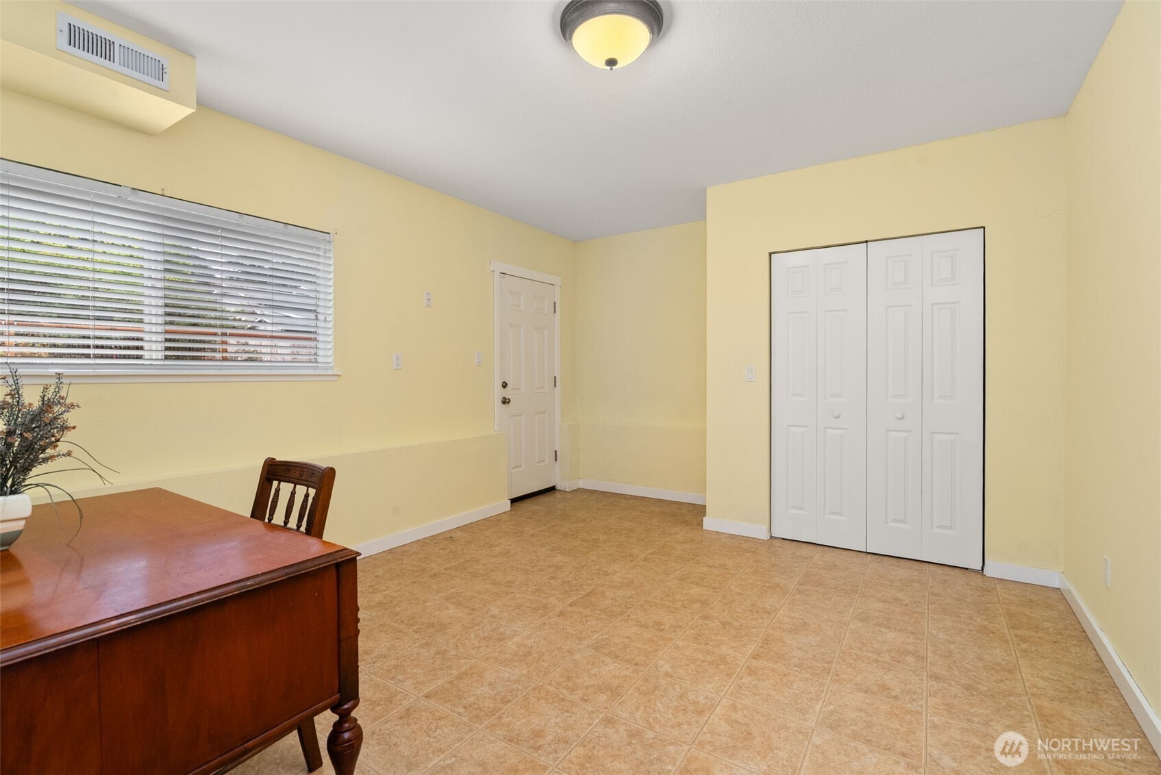 1105 Irving Street Southwest Tumwater, WA 98512 - Photo 26 of 38 a view of a room with a window and a ceiling fan
