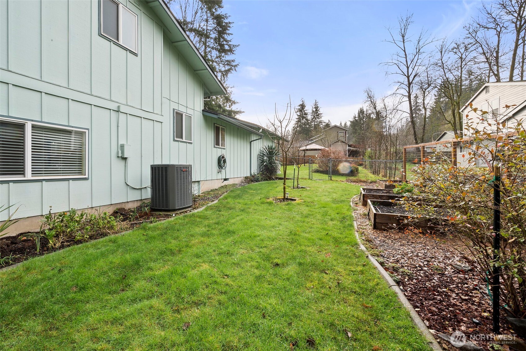1105 Irving Street Southwest Tumwater, WA 98512 - Photo 32 of 38 a view of a backyard with garden