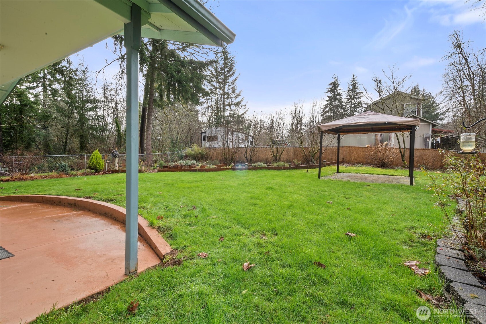 1105 Irving Street Southwest Tumwater, WA 98512 - Photo 33 of 38 a view of a garden with a slide