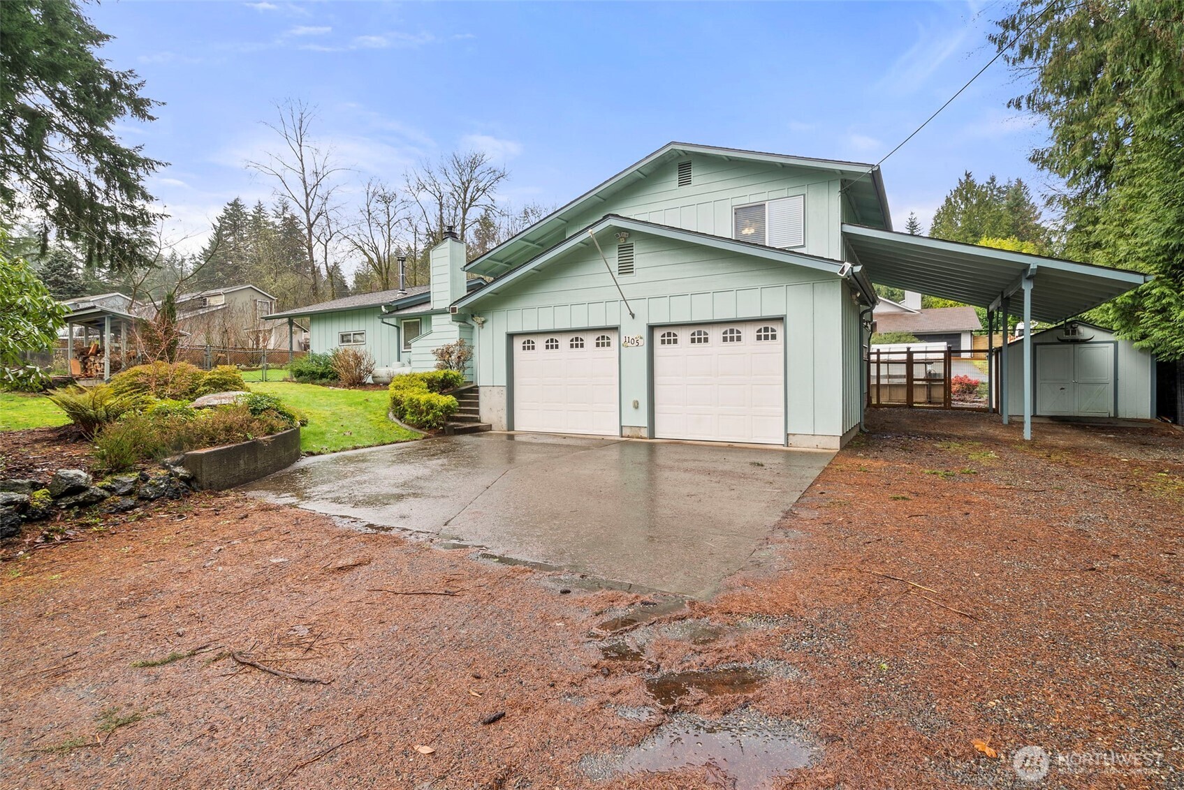 1105 Irving Street Southwest Tumwater, WA 98512 - Photo 38 of 38 a view of a house with a yard and plants