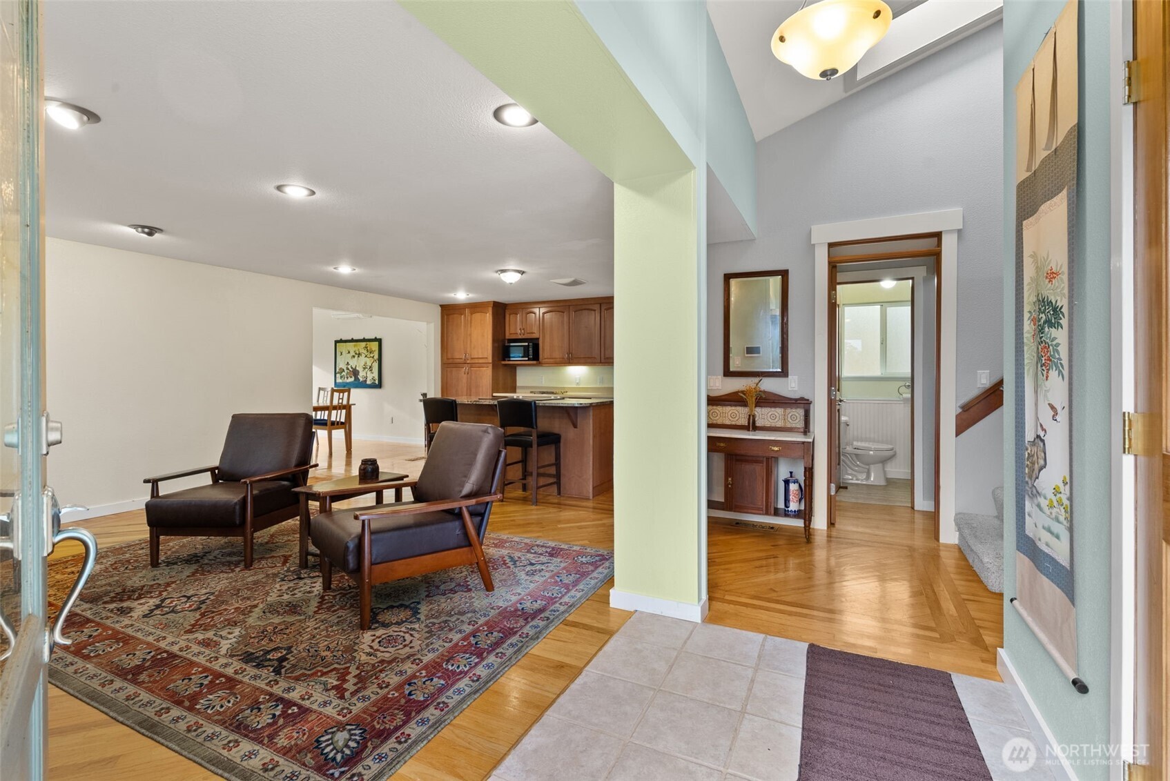 1105 Irving Street Southwest Tumwater, WA 98512 - Photo 5 of 38 a living room with furniture and a rug