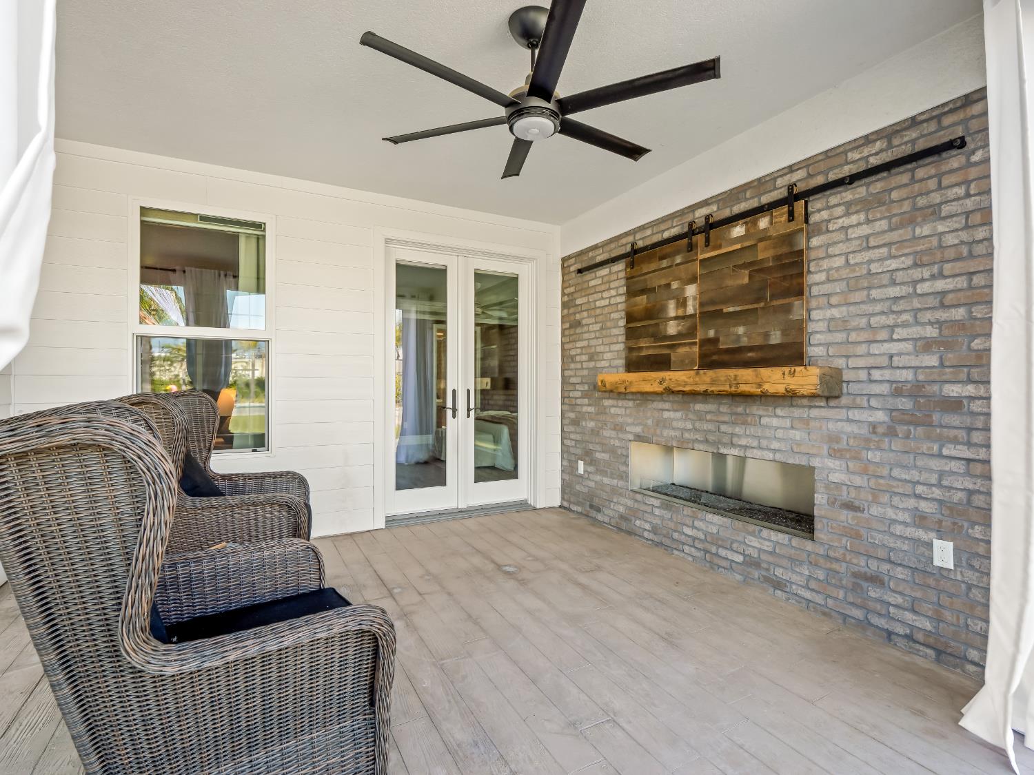 17113 Mark Road Madera, CA 93636 - Photo 69 of 99 a living room with furniture and a flat screen tv