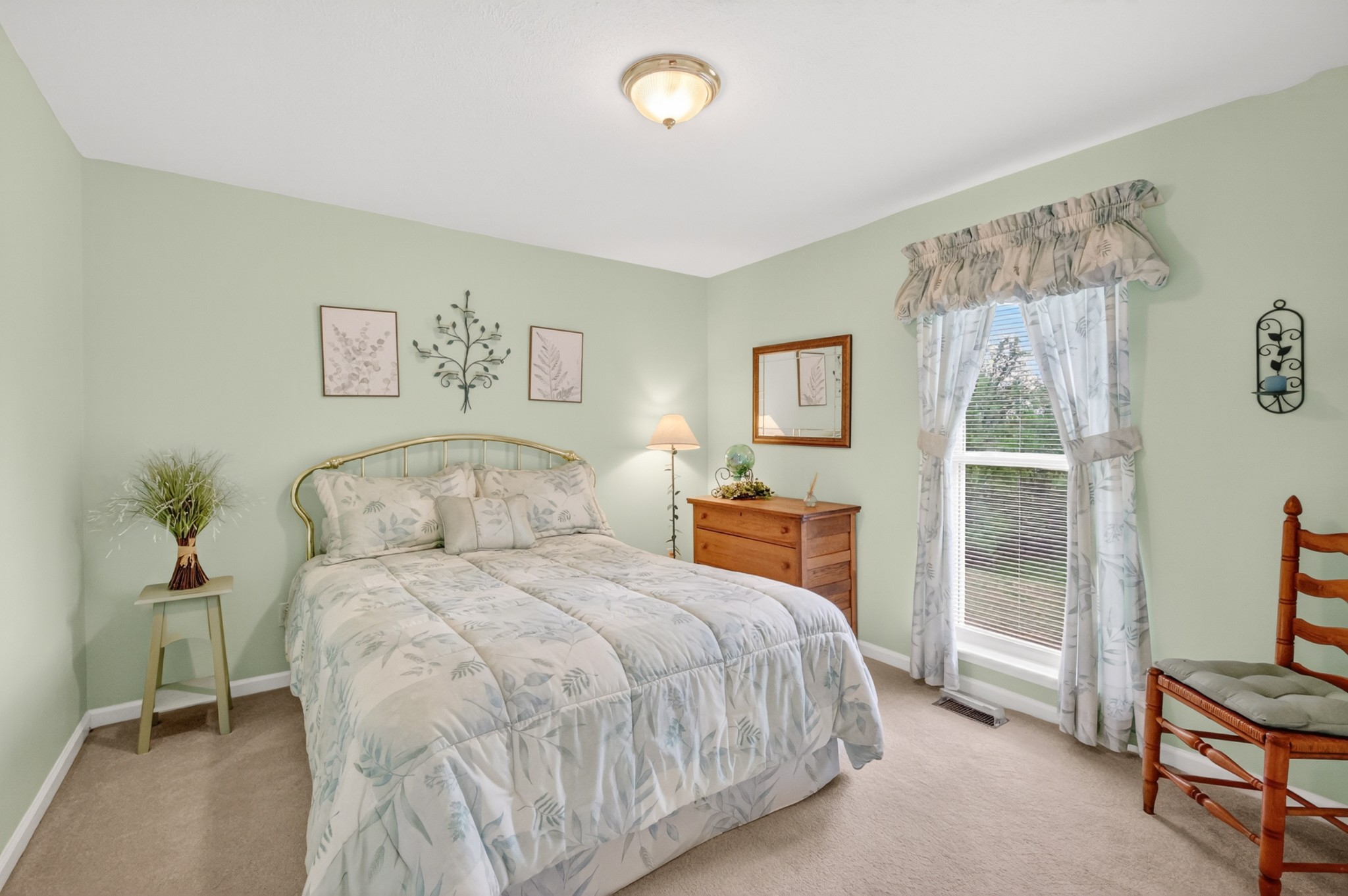 590 Allisona Road Eagleville, TN 37060 - Photo 24 of 55 a bedroom with a bed and a tv on the dresser
