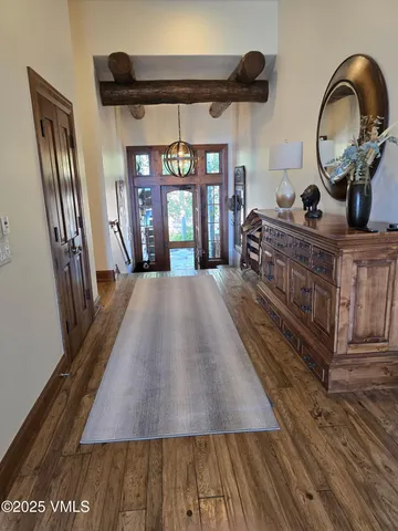 a view of living room with furniture and window