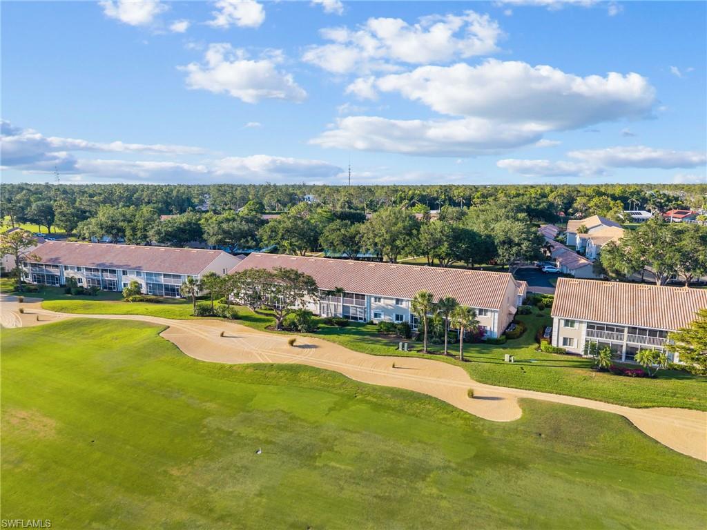5928 Cranbrook Way, Unit D202 Naples, FL 34112 - Photo 18 of 23 Aerial view featuring view of golf course