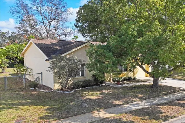 an aerial view of residential house with outdoor space