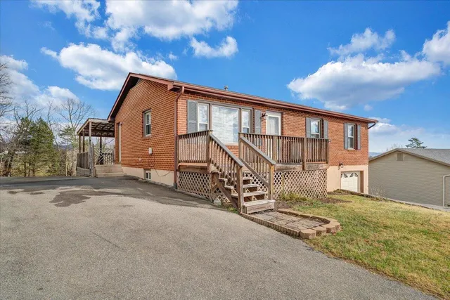 a view of a house with a big yard