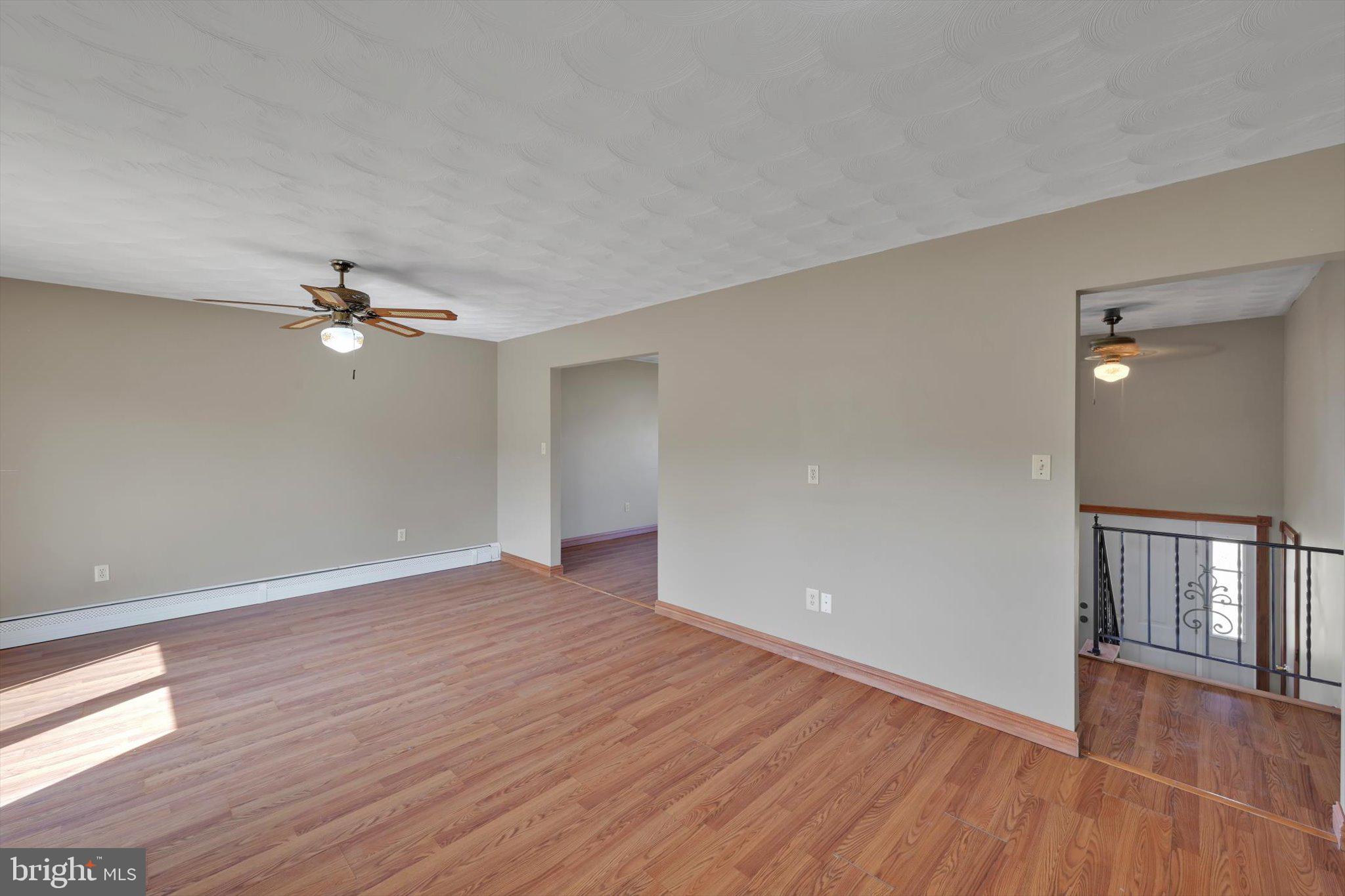 301 West Walnut Street Valley View, PA 17983 - Photo 13 of 40 a view of empty room with wooden floor