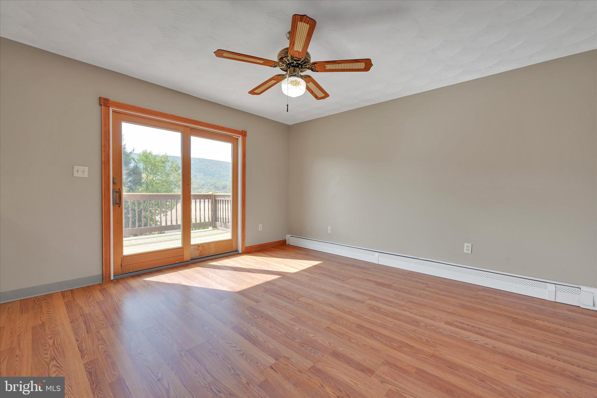 301 West Walnut Street Valley View, PA 17983 - Photo 14 of 40 wooden floor in an empty room with a window