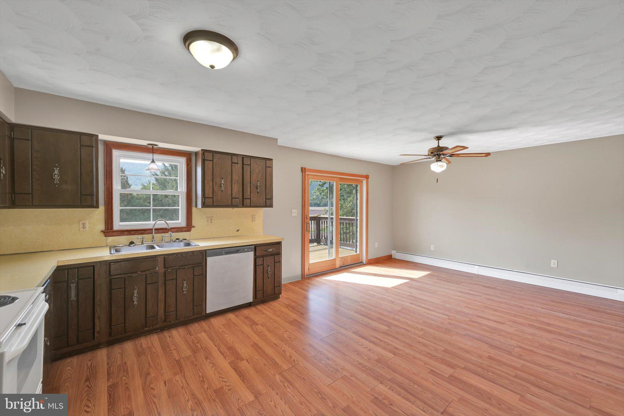 301 West Walnut Street Valley View, PA 17983 - Photo 18 of 40 a large kitchen with granite countertop a stove a sink dishwasher and a large oven
