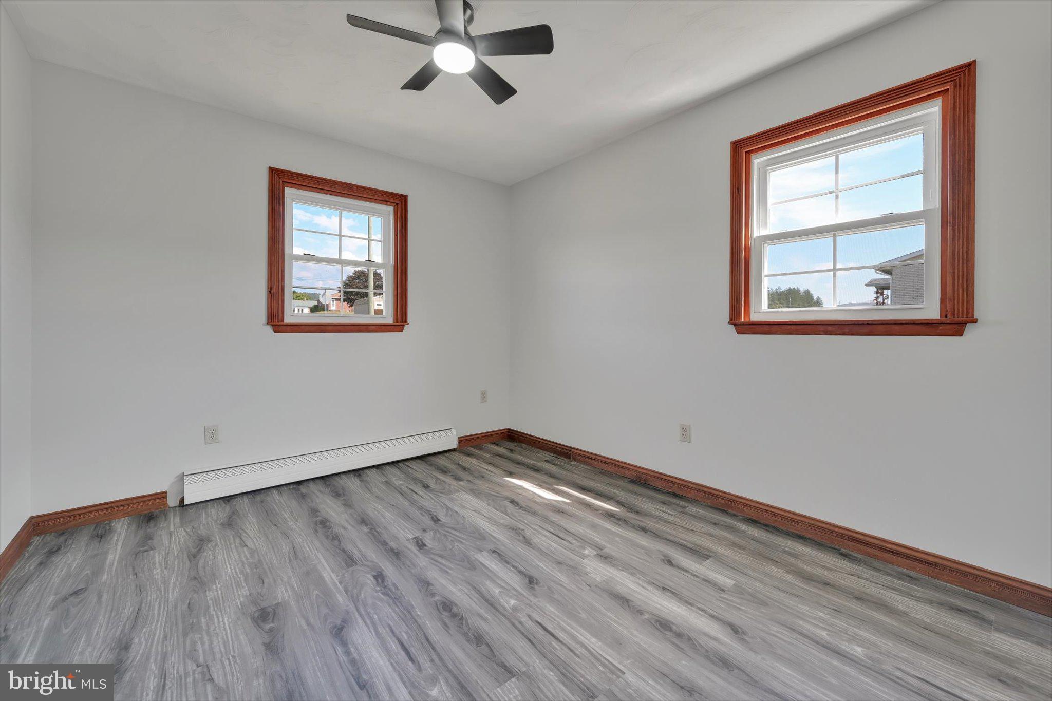 301 West Walnut Street Valley View, PA 17983 - Photo 21 of 40 a view of empty room with wooden floor and fan
