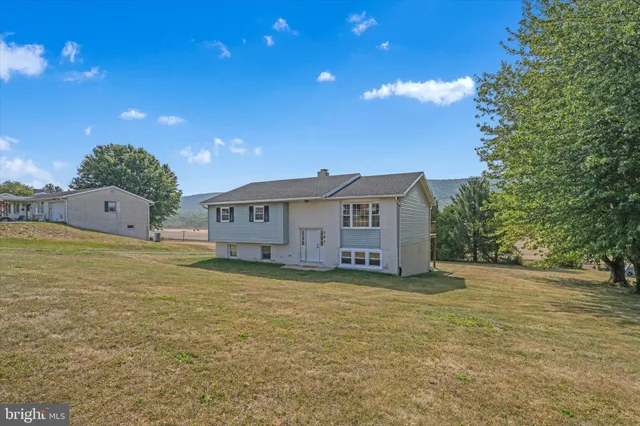 a view of outdoor space and yard