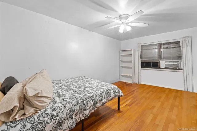 a view of a livingroom with furniture and staircase