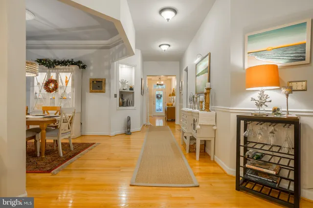 a kitchen with stainless steel appliances a stove a sink and a refrigerator