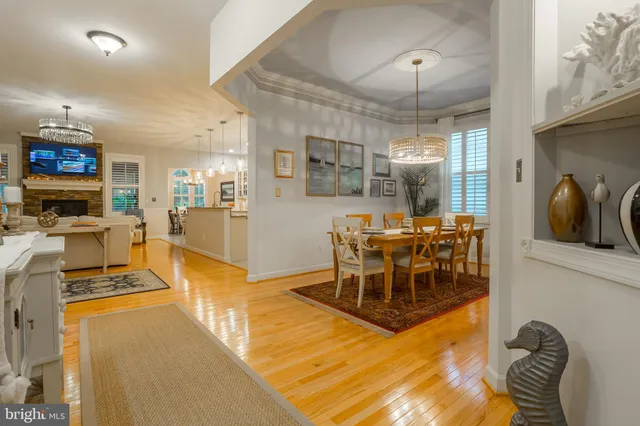 a large kitchen with kitchen island granite countertop a sink and a stove