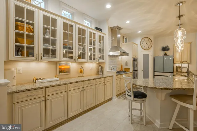 a outdoor living space with furniture and a fireplace