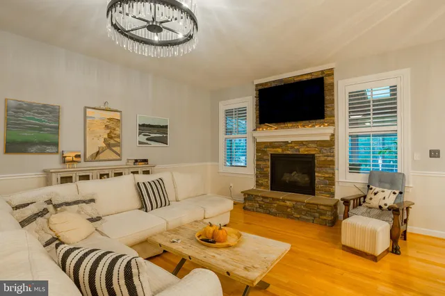 a view of a patio with table and chairs and potted plants