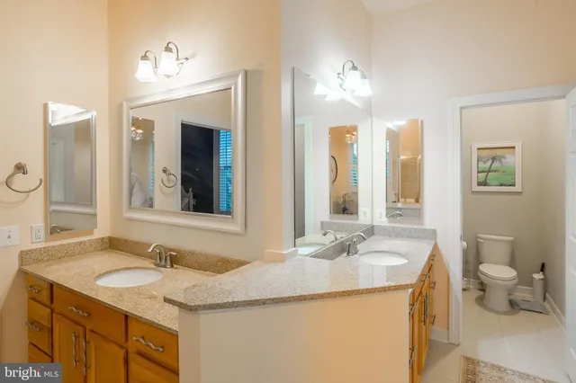 a view of a backyard with sitting area