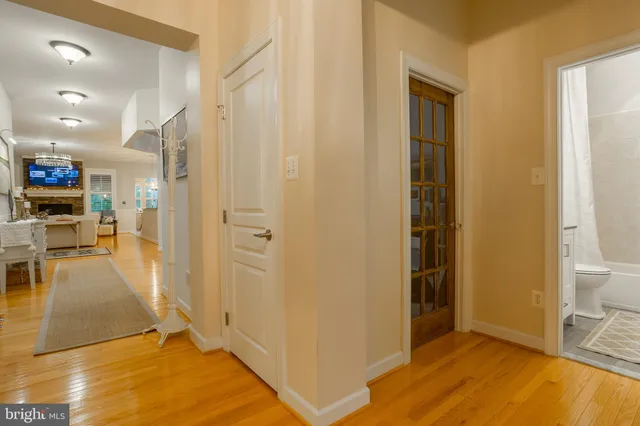 an aerial view of a house with swimming pool and mountain view