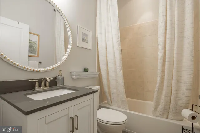 an aerial view of a swimming pool yard and outdoor seating
