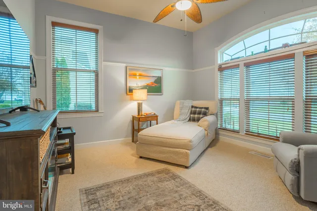 an aerial view of residential house with outdoor space and swimming pool
