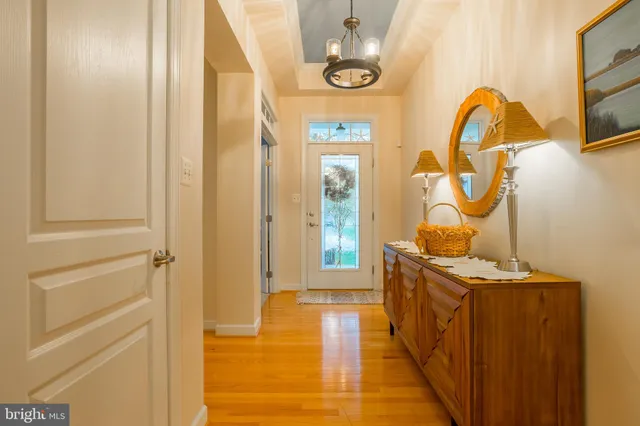 a view of a dining room with furniture and window