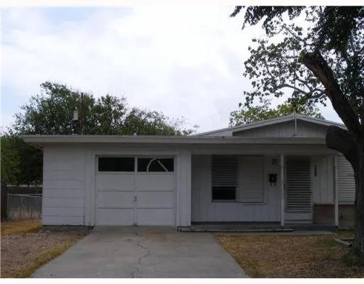 a front view of a house with a garage