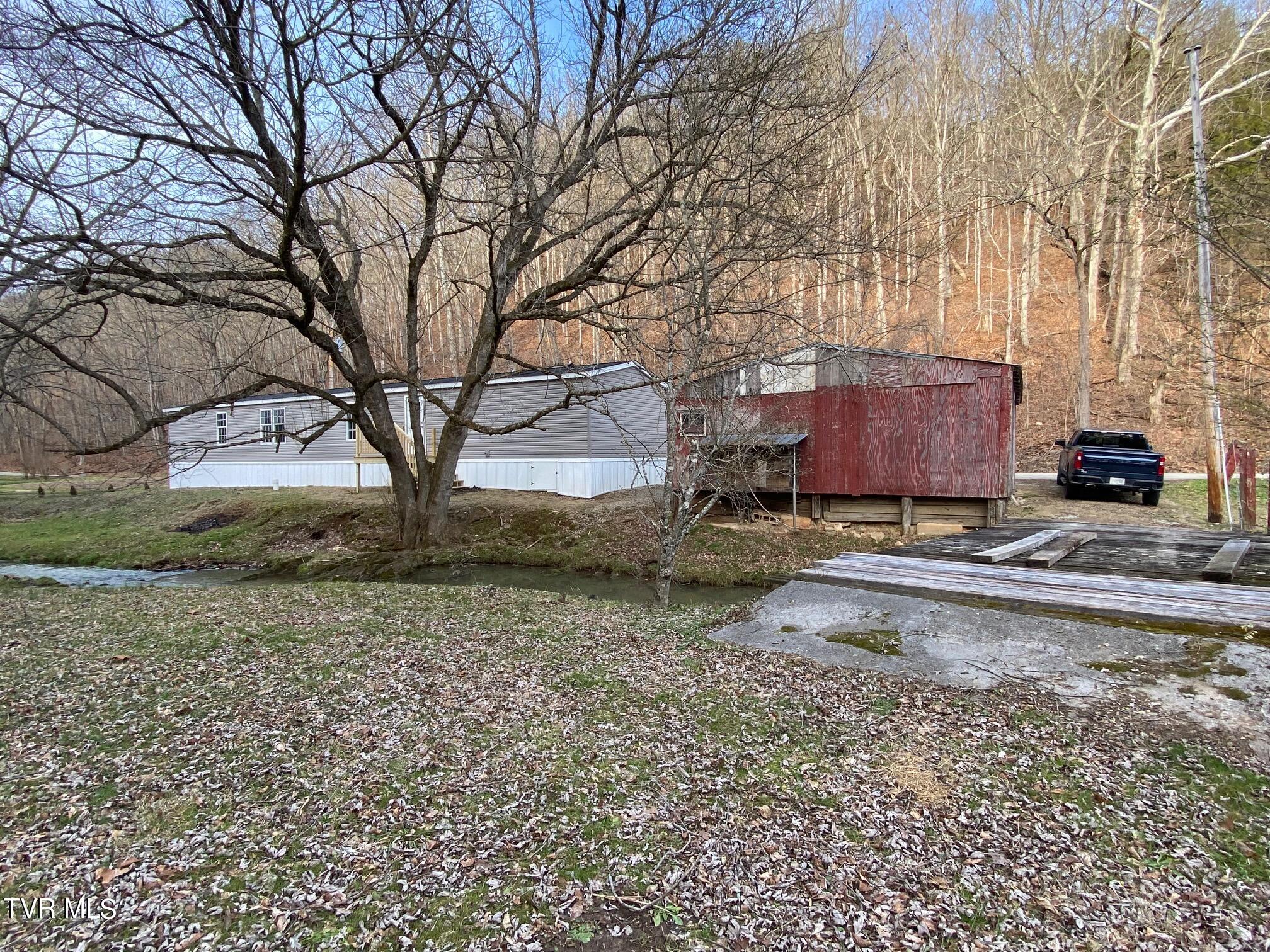 2680 Dulaney Road Mosheim, TN 37818 - Photo 8 of 32 7 - Rear Property View