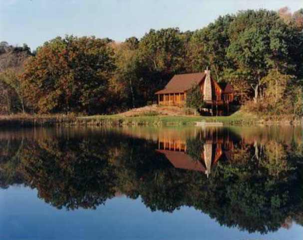 5060 South Blanding Road Hanover, IL 61041 - Photo 1 of 9 a view of a lake from a yard