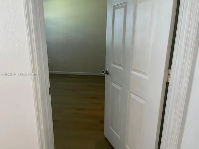 a view of a room has a window