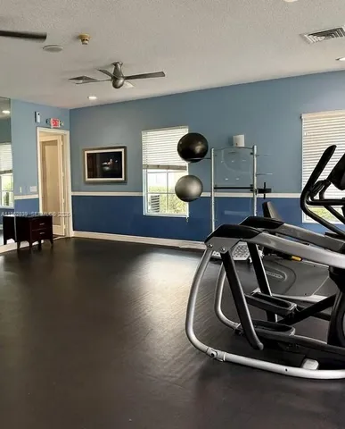 a front view of house with yard and outdoor seating