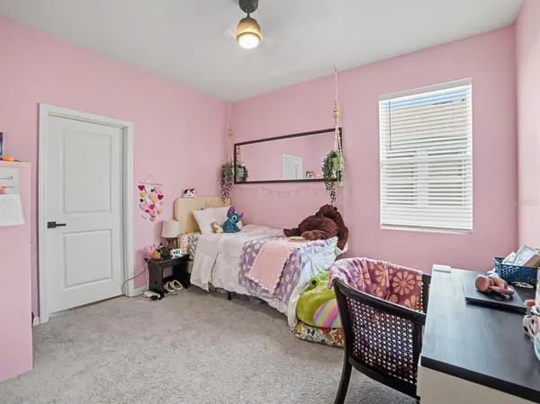 a bathroom with a granite countertop sink a mirror and a