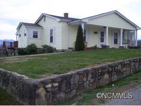 282 Phillipsville Loop Canton, NC 28716 - Photo 19 of 19 a front view of a house with a yard
